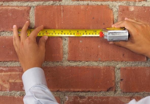 materialy budowlane cegla sciana miarka