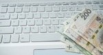 zlotowki banknoty laptop